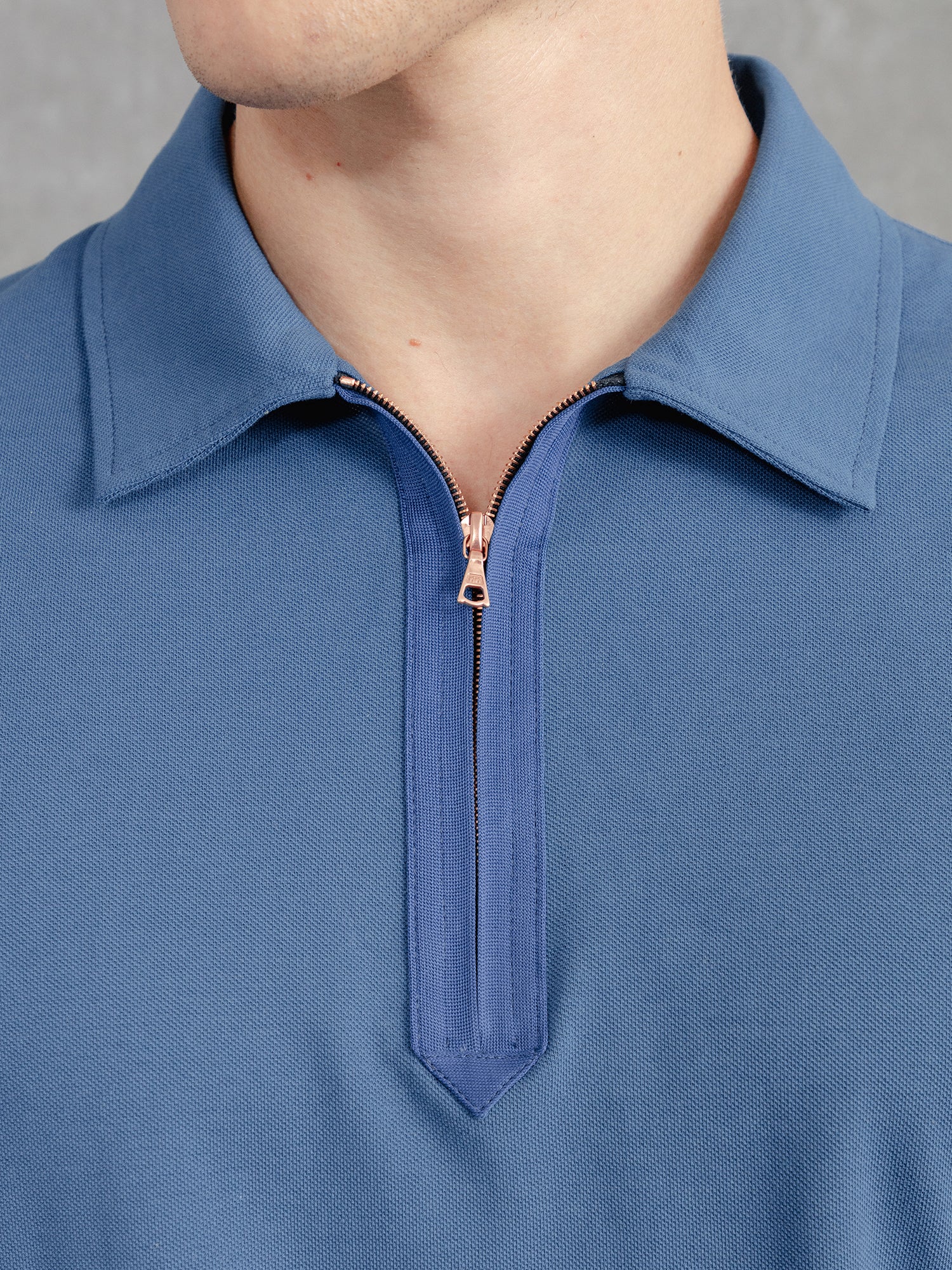 the-ashley-zip-polo-prussian-blue